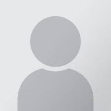 Generic gray user profile silhouette on white background.